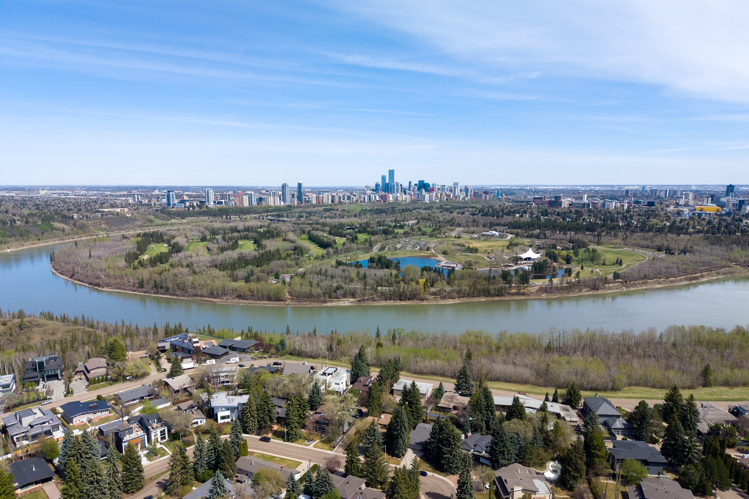 The North Saskatchewan river valley winding through Edmonton's neighbourhoods
